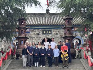 BDA group in the front of a temple